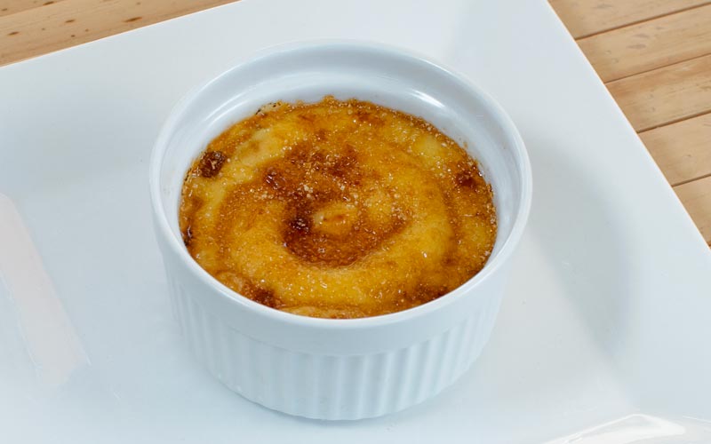 PalmBeach Tropical Restaurant | Crema Catalana | soffice e spumosa crema inglese sormontata da una pellicola di croccante zucchero di canna flambato